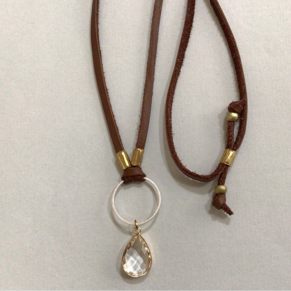 handcrafted Sundance charm necklace genuine leather cord clear quartz bezel